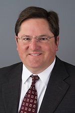 Charles E. Simpson, Jr. (retired)